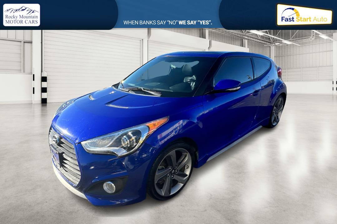 2015 Blue Hyundai Veloster Turbo 6AT (KMHTC6AE6FU) with an 1.6L L4 DOHC 16V TURBO engine, 6-Speed Automatic transmission, located at 767 S State Road, Pleasant Grove, UT, 84062, (801) 785-1058, 40.354839, -111.736687 - Photo #6