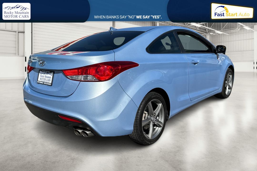 2013 Blue Hyundai Elantra GS Coupe A/T (KMHDH6AE5DU) with an 1.8L L4 DOHC 16V engine, 6-Speed Automatic transmission, located at 7755 State Street, Midvale, UT, 84047, (801) 753-9063, 40.610329, -111.892159 - Photo #2