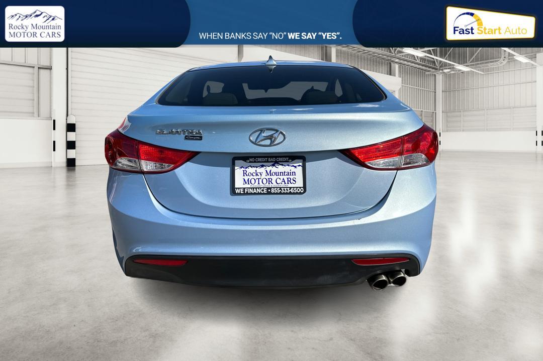 2013 Blue Hyundai Elantra GS Coupe A/T (KMHDH6AE5DU) with an 1.8L L4 DOHC 16V engine, 6-Speed Automatic transmission, located at 7755 State Street, Midvale, UT, 84047, (801) 753-9063, 40.610329, -111.892159 - Photo #3