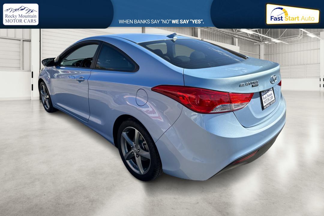 2013 Blue Hyundai Elantra GS Coupe A/T (KMHDH6AE5DU) with an 1.8L L4 DOHC 16V engine, 6-Speed Automatic transmission, located at 7755 State Street, Midvale, UT, 84047, (801) 753-9063, 40.610329, -111.892159 - Photo #4