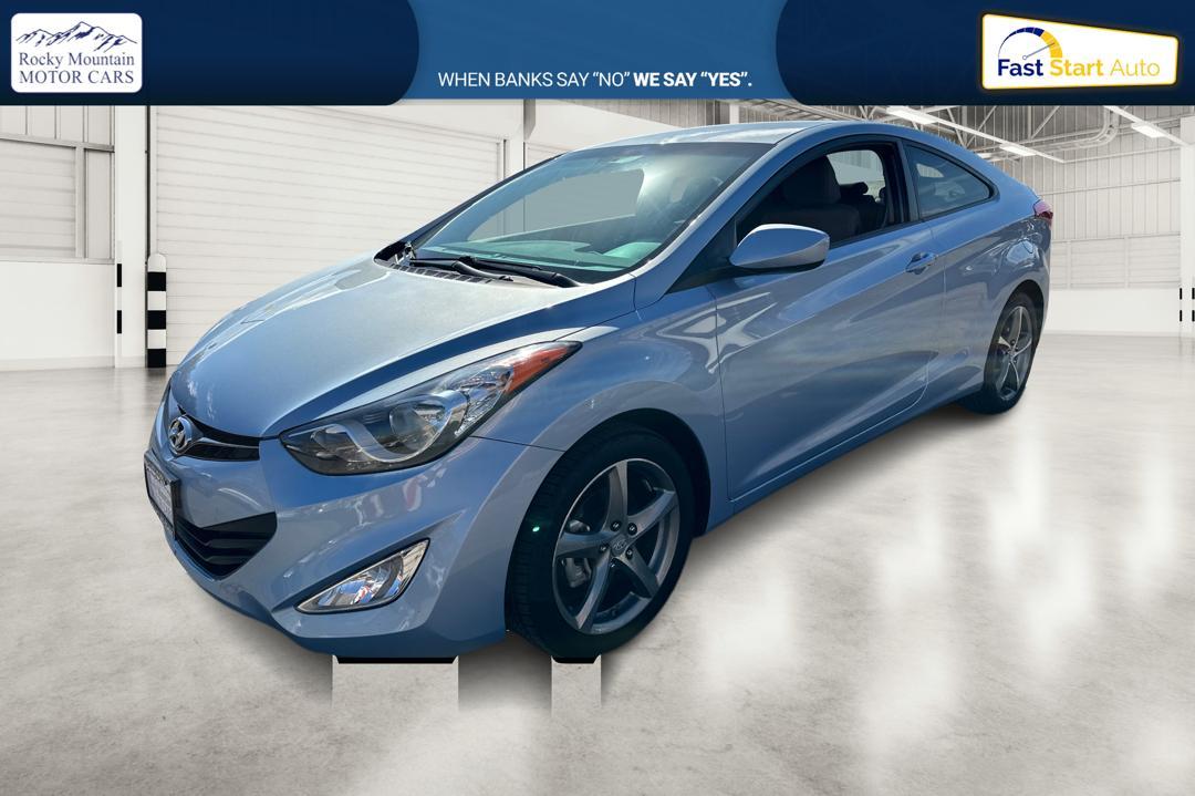 2013 Blue Hyundai Elantra GS Coupe A/T (KMHDH6AE5DU) with an 1.8L L4 DOHC 16V engine, 6-Speed Automatic transmission, located at 7755 State Street, Midvale, UT, 84047, (801) 753-9063, 40.610329, -111.892159 - Photo #6