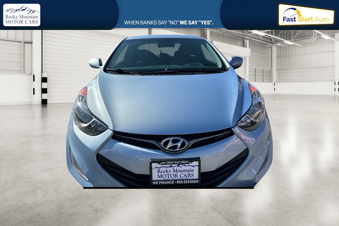 2013 Blue Hyundai Elantra GS Coupe A/T (KMHDH6AE5DU) with an 1.8L L4 DOHC 16V engine, 6-Speed Automatic transmission, located at 7755 State Street, Midvale, UT, 84047, (801) 753-9063, 40.610329, -111.892159 - Photo #7