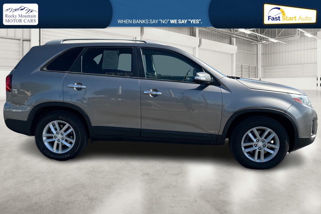 2015 Silver Kia Sorento LX AWD (5XYKTCA6XFG) with an 2.4L L4 DOHC 16V engine, 6-Speed Automatic transmission, located at 7755 State Street, Midvale, UT, 84047, (801) 753-9063, 40.610329, -111.892159 - Photo#1
