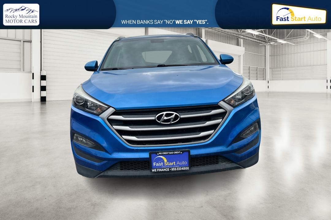 2017 Blue Hyundai Tucson SE w/Preferred Package (KM8J33A47HU) with an 2.0L L4 DOHC 16V engine, 6A transmission, located at 344 S Washington Blvd, Ogden, UT, 84404, (801) 399-1799, 41.255482, -111.970848 - Photo #7