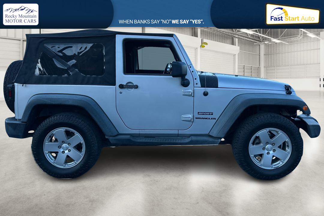 2011 Silver Jeep Wrangler Sport 4WD (1J4AA2D16BL) with an 3.8L V6 OHV 12V engine, Automatic, 4-Spd w/Overdrive transmission, located at 767 S State Road, Pleasant Grove, UT, 84062, (801) 785-1058, 40.354839, -111.736687 - Photo#1