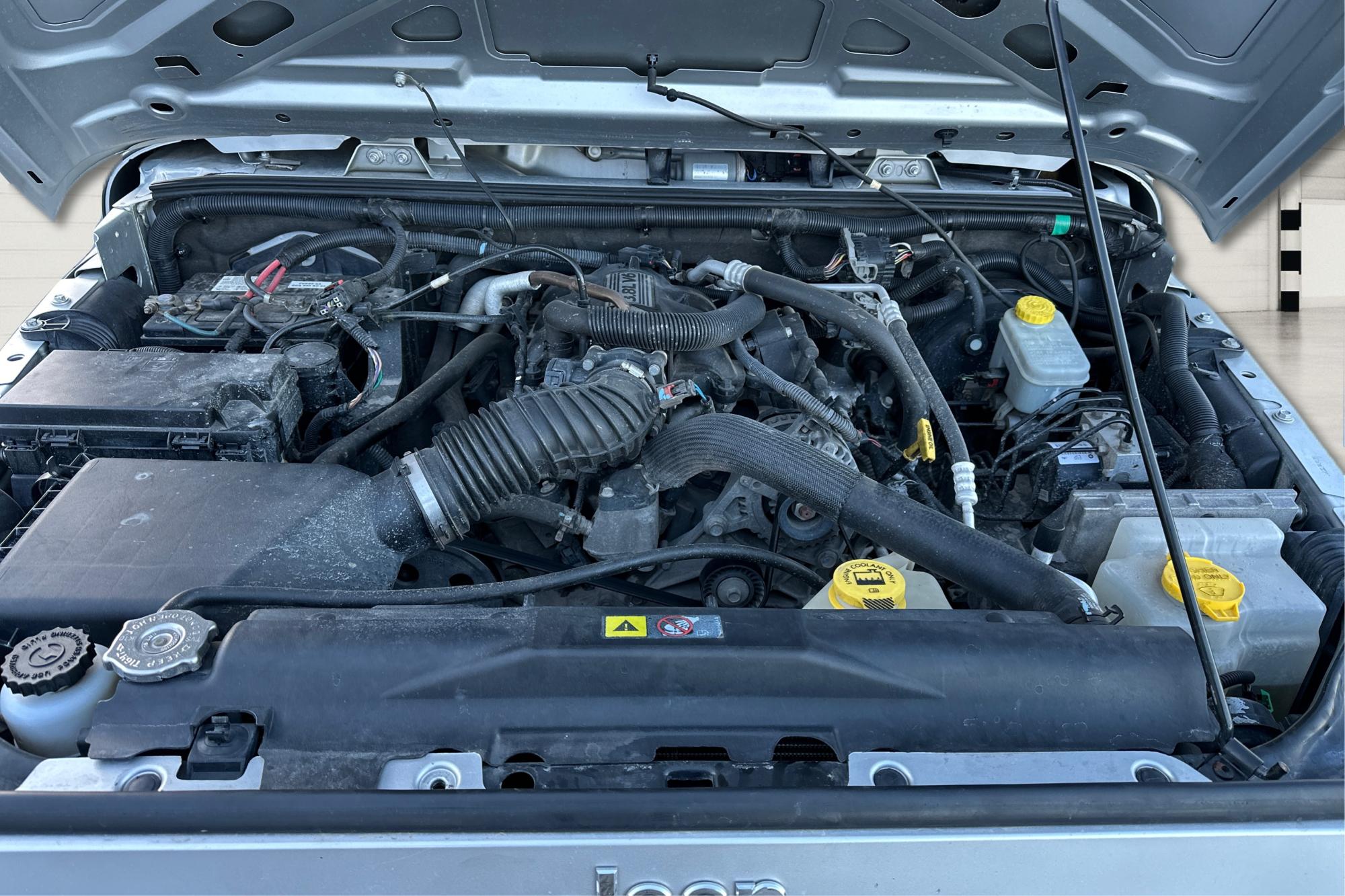 2011 Silver Jeep Wrangler Sport 4WD (1J4AA2D16BL) with an 3.8L V6 OHV 12V engine, Automatic, 4-Spd w/Overdrive transmission, located at 767 S State Road, Pleasant Grove, UT, 84062, (801) 785-1058, 40.354839, -111.736687 - Photo#10