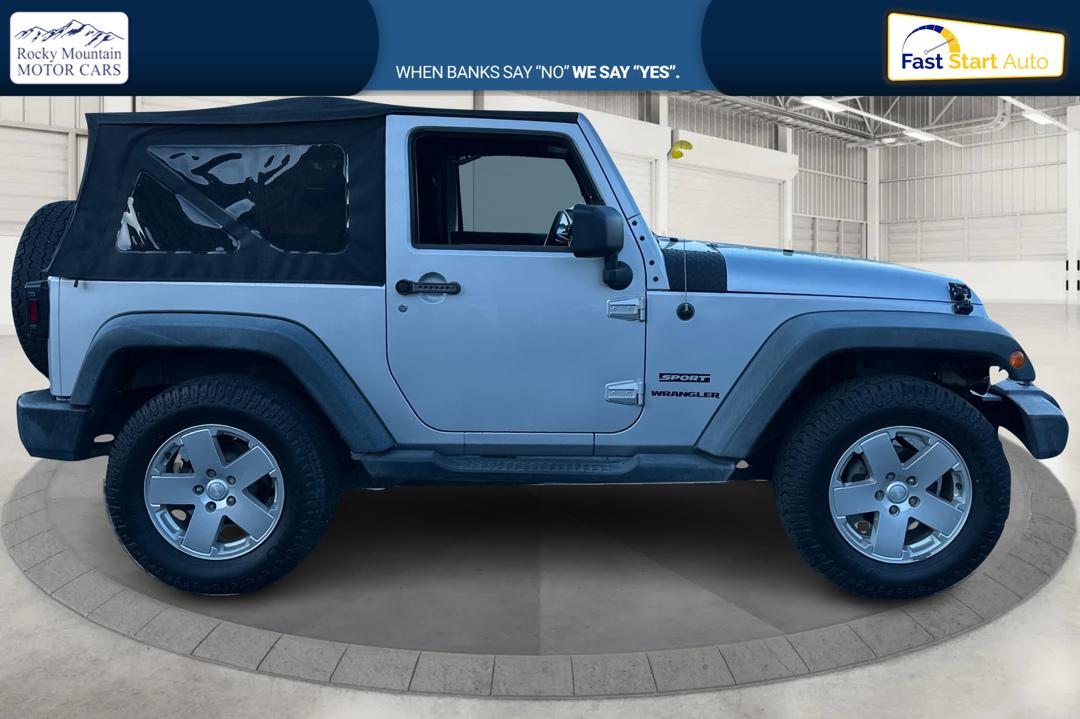 2011 Silver Jeep Wrangler Sport 4WD (1J4AA2D16BL) with an 3.8L V6 OHV 12V engine, Automatic, 4-Spd w/Overdrive transmission, located at 767 S State Road, Pleasant Grove, UT, 84062, (801) 785-1058, 40.354839, -111.736687 - Photo#1