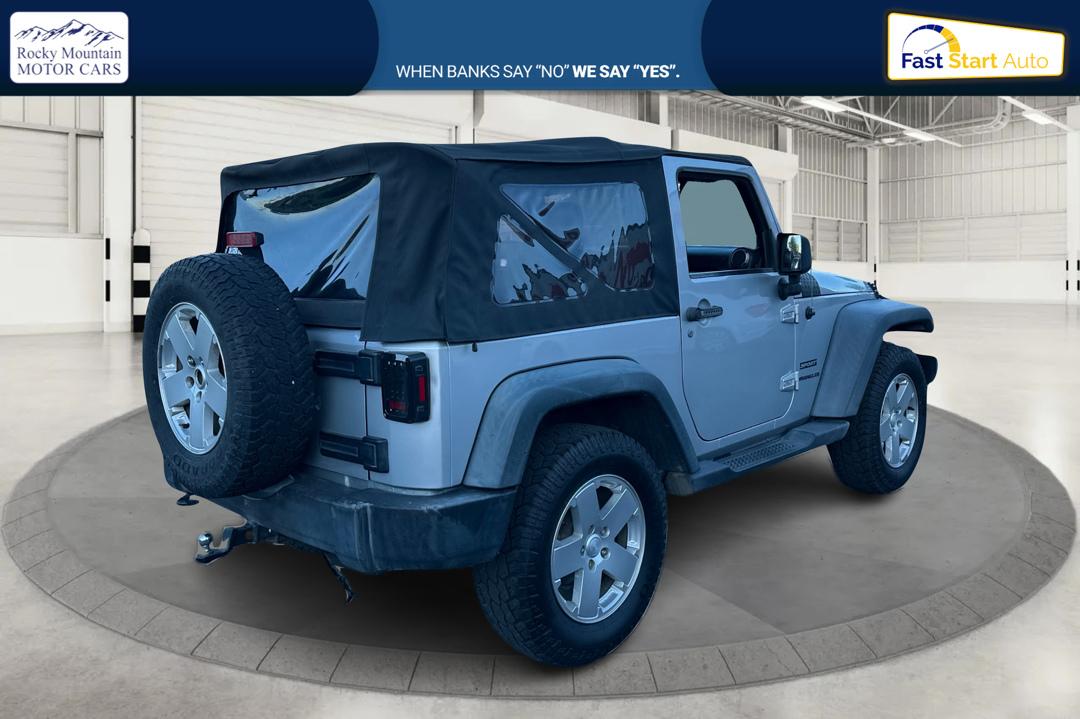 2011 Silver Jeep Wrangler Sport 4WD (1J4AA2D16BL) with an 3.8L V6 OHV 12V engine, Automatic, 4-Spd w/Overdrive transmission, located at 767 S State Road, Pleasant Grove, UT, 84062, (801) 785-1058, 40.354839, -111.736687 - Photo#2