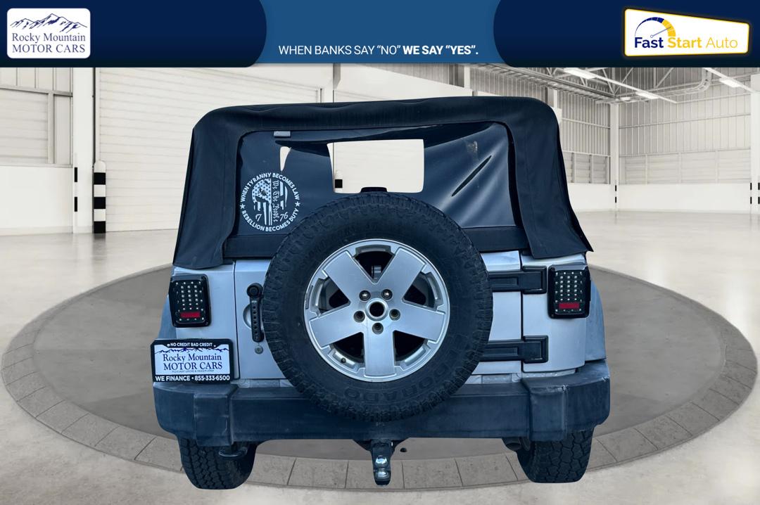 2011 Silver Jeep Wrangler Sport 4WD (1J4AA2D16BL) with an 3.8L V6 OHV 12V engine, Automatic, 4-Spd w/Overdrive transmission, located at 767 S State Road, Pleasant Grove, UT, 84062, (801) 785-1058, 40.354839, -111.736687 - Photo#3