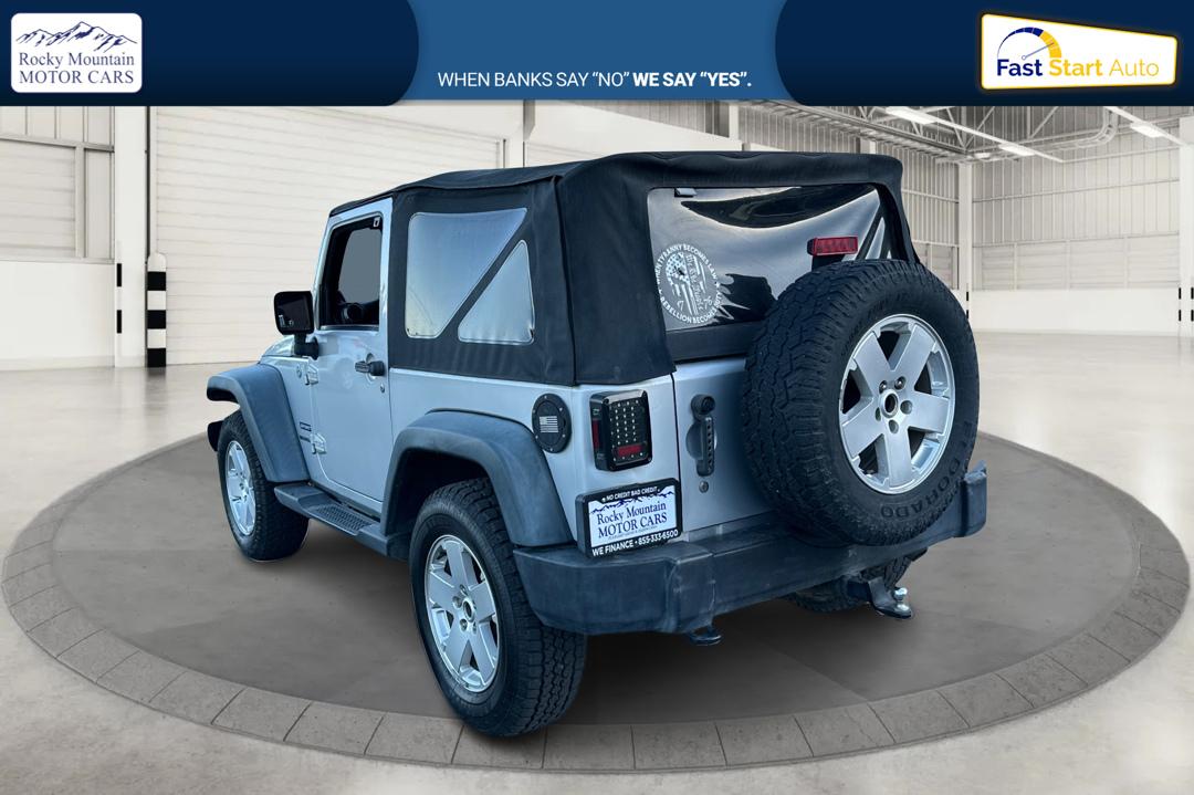 2011 Silver Jeep Wrangler Sport 4WD (1J4AA2D16BL) with an 3.8L V6 OHV 12V engine, Automatic, 4-Spd w/Overdrive transmission, located at 767 S State Road, Pleasant Grove, UT, 84062, (801) 785-1058, 40.354839, -111.736687 - Photo#4