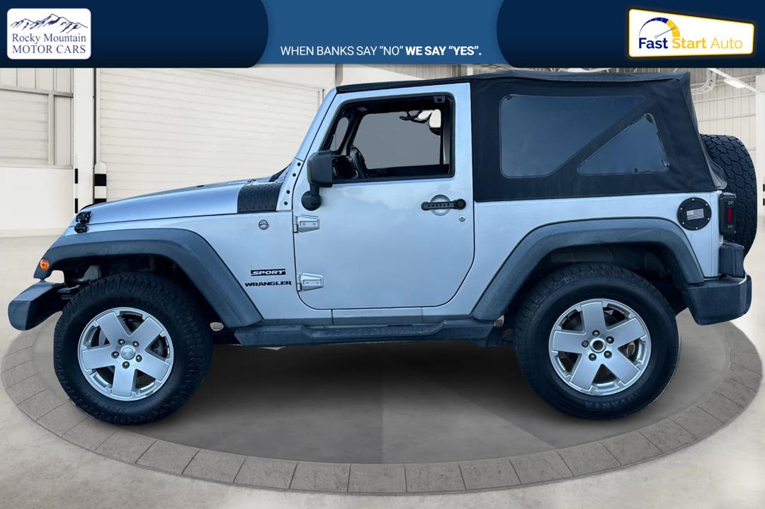 2011 Silver Jeep Wrangler Sport 4WD (1J4AA2D16BL) with an 3.8L V6 OHV 12V engine, Automatic, 4-Spd w/Overdrive transmission, located at 767 S State Road, Pleasant Grove, UT, 84062, (801) 785-1058, 40.354839, -111.736687 - Photo#5