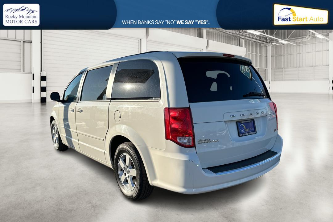 2012 White Dodge Grand Caravan SXT (2C4RDGCG9CR) with an 3.6L V6 DOHC 24V engine, 6-Speed Automatic transmission, located at 7755 State Street, Midvale, UT, 84047, (801) 753-9063, 40.610329, -111.890656 - Photo#5