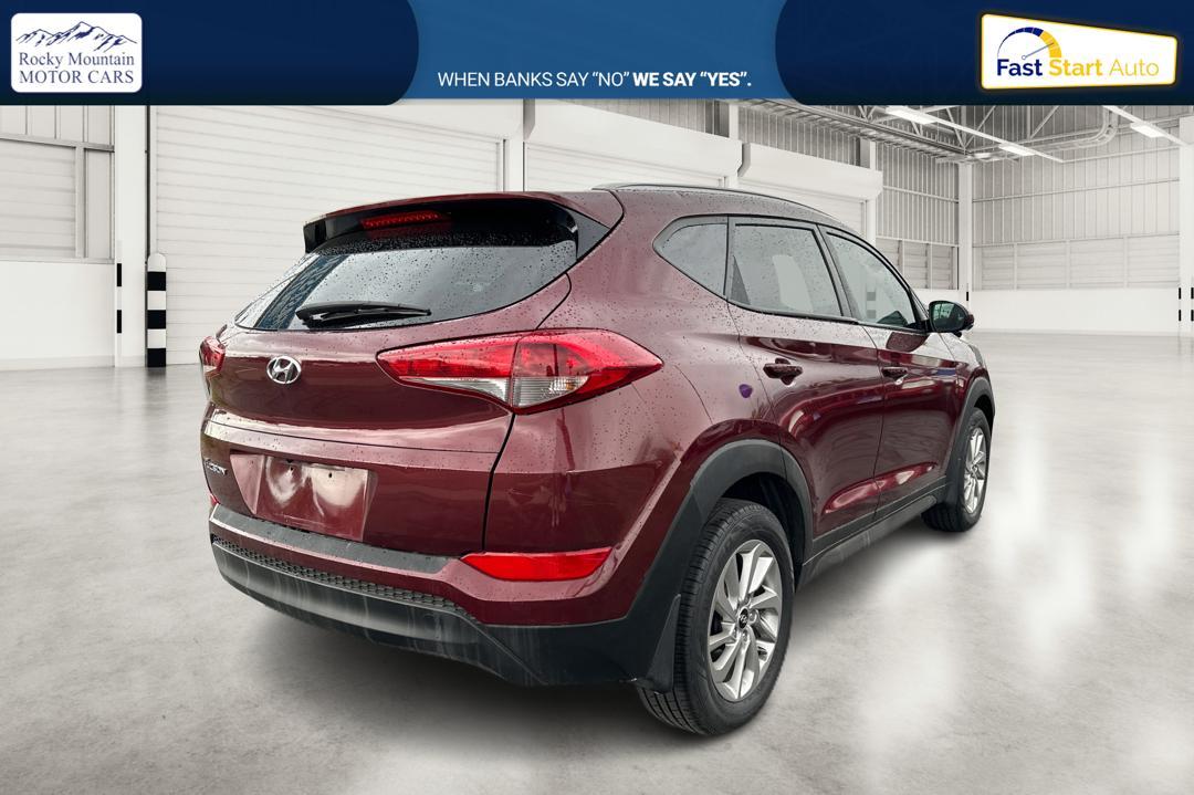 2016 Red Hyundai Tucson SE w/Preferred Package (KM8J33A41GU) with an 2.0L L4 DOHC 16V engine, 6A transmission, located at 7755 State Street, Midvale, UT, 84047, (801) 753-9063, 40.610329, -111.890656 - Photo #2