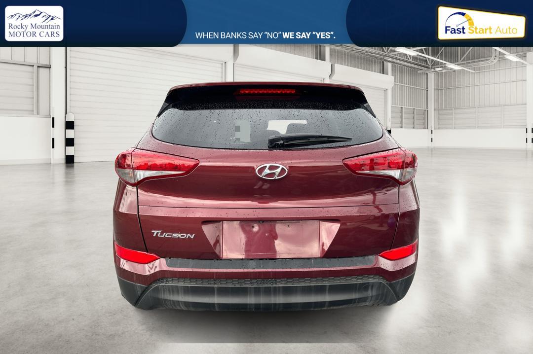 2016 Red Hyundai Tucson SE w/Preferred Package (KM8J33A41GU) with an 2.0L L4 DOHC 16V engine, 6A transmission, located at 7755 State Street, Midvale, UT, 84047, (801) 753-9063, 40.610329, -111.890656 - Photo #3