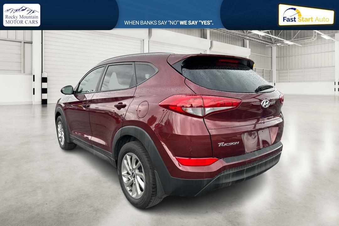 2016 Red Hyundai Tucson SE w/Preferred Package (KM8J33A41GU) with an 2.0L L4 DOHC 16V engine, 6A transmission, located at 7755 State Street, Midvale, UT, 84047, (801) 753-9063, 40.610329, -111.890656 - Photo #4
