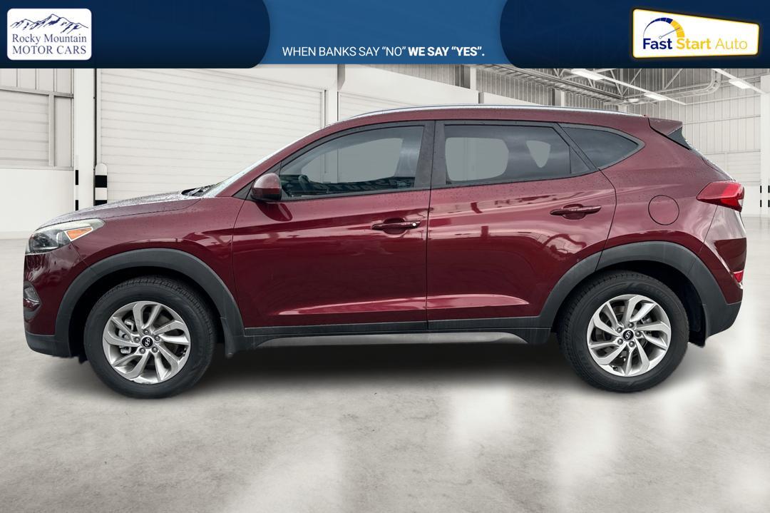 2016 Red Hyundai Tucson SE w/Preferred Package (KM8J33A41GU) with an 2.0L L4 DOHC 16V engine, 6A transmission, located at 7755 State Street, Midvale, UT, 84047, (801) 753-9063, 40.610329, -111.890656 - Photo #5