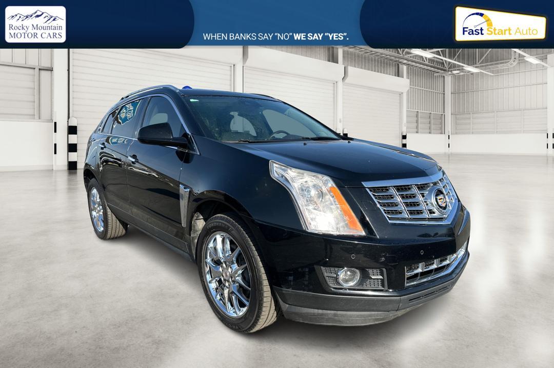 2014 Black Cadillac SRX Premium Collection FWD (3GYFNDE30ES) with an 3.6L V6 DOHC 24V FFV engine, 6-Speed Automatic transmission, located at 7755 State Street, Midvale, UT, 84047, (801) 753-9063, 40.610329, -111.890656 - Photo #0