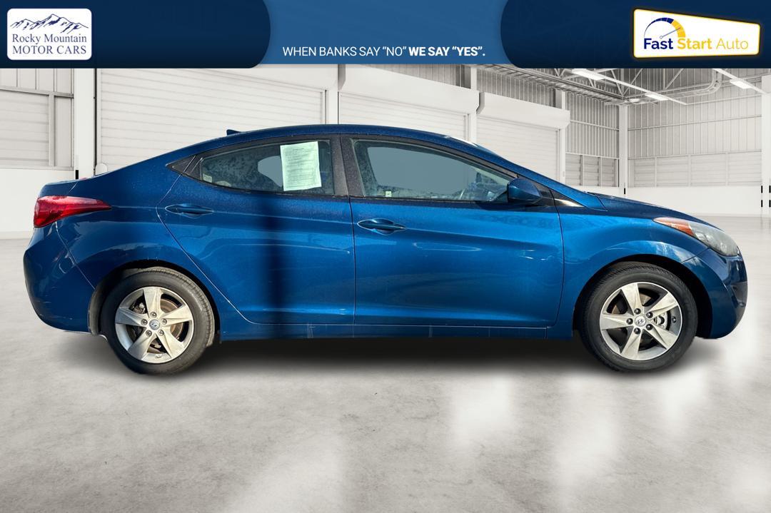 2013 Blue Hyundai Elantra GLS A/T (KMHDH4AE8DU) with an 1.8L L4 DOHC 16V engine, 6-Speed Automatic transmission, located at 7755 State Street, Midvale, UT, 84047, (801) 753-9063, 40.610329, -111.890656 - Photo #1