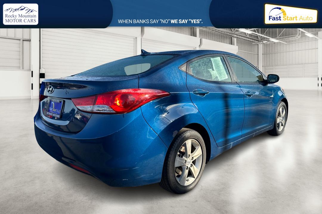 2013 Blue Hyundai Elantra GLS A/T (KMHDH4AE8DU) with an 1.8L L4 DOHC 16V engine, 6-Speed Automatic transmission, located at 7755 State Street, Midvale, UT, 84047, (801) 753-9063, 40.610329, -111.890656 - Photo #2