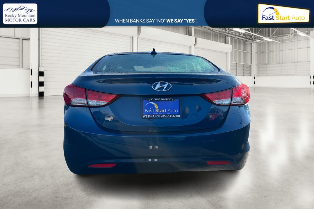 2013 Blue Hyundai Elantra GLS A/T (KMHDH4AE8DU) with an 1.8L L4 DOHC 16V engine, 6-Speed Automatic transmission, located at 7755 State Street, Midvale, UT, 84047, (801) 753-9063, 40.610329, -111.890656 - Photo #3