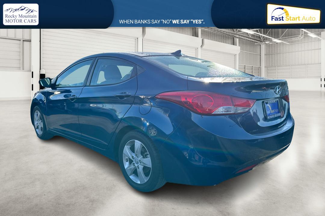 2013 Blue Hyundai Elantra GLS A/T (KMHDH4AE8DU) with an 1.8L L4 DOHC 16V engine, 6-Speed Automatic transmission, located at 7755 State Street, Midvale, UT, 84047, (801) 753-9063, 40.610329, -111.890656 - Photo #4