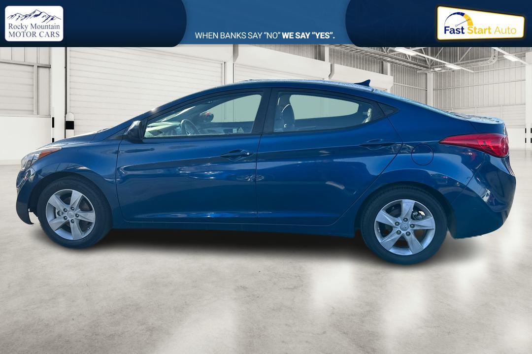 2013 Blue Hyundai Elantra GLS A/T (KMHDH4AE8DU) with an 1.8L L4 DOHC 16V engine, 6-Speed Automatic transmission, located at 7755 State Street, Midvale, UT, 84047, (801) 753-9063, 40.610329, -111.890656 - Photo #5