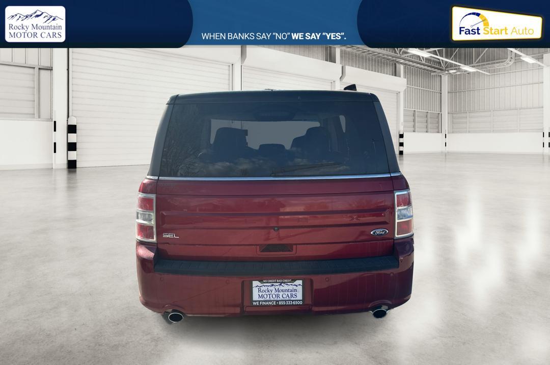 2015 Red Ford Flex SEL FWD (2FMGK5C85FB) with an 3.5L V6 DOHC 24V engine, 6-Speed Automatic Overdrive transmission, located at 344 S Washington Blvd, Ogden, UT, 84404, (801) 399-1799, 41.255482, -111.970848 - Photo #3