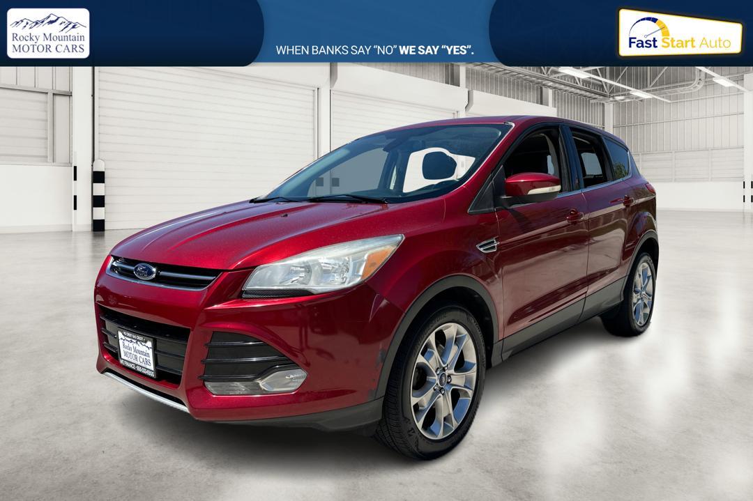 2013 Red Ford Escape SEL FWD (1FMCU0HX1DU) with an 1.6L L4 DOHC 16V engine, 6-Speed Automatic transmission, located at 767 S State Road, Pleasant Grove, UT, 84062, (801) 785-1058, 40.354839, -111.736687 - Photo #6