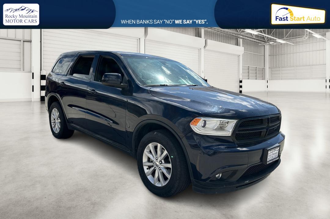 2015 Blue Dodge Durango SXT AWD (1C4RDJAG6FC) with an 3.6L V6 DOHC 24V engine, 8-Speed Automatic transmission, located at 767 S State Road, Pleasant Grove, UT, 84062, (801) 785-1058, 40.354839, -111.736687 - Photo #0