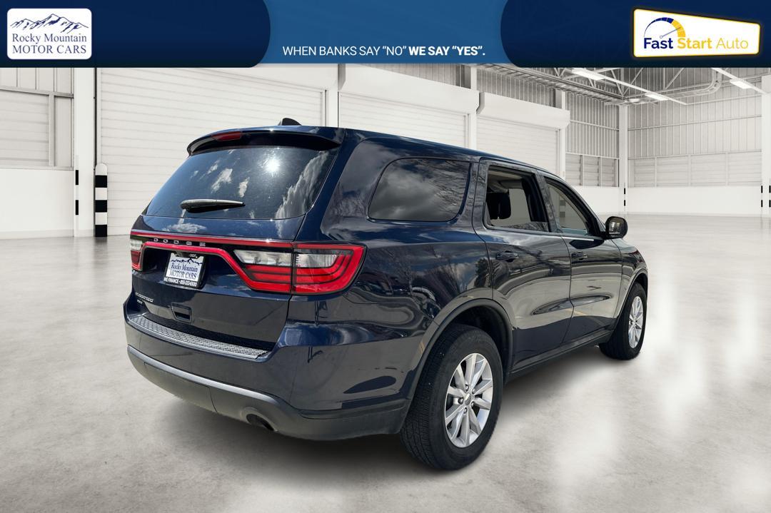 2015 Blue Dodge Durango SXT AWD (1C4RDJAG6FC) with an 3.6L V6 DOHC 24V engine, 8-Speed Automatic transmission, located at 767 S State Road, Pleasant Grove, UT, 84062, (801) 785-1058, 40.354839, -111.736687 - Photo #2