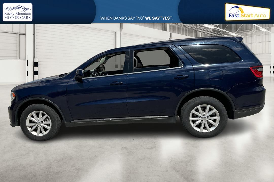 2015 Blue Dodge Durango SXT AWD (1C4RDJAG6FC) with an 3.6L V6 DOHC 24V engine, 8-Speed Automatic transmission, located at 767 S State Road, Pleasant Grove, UT, 84062, (801) 785-1058, 40.354839, -111.736687 - Photo #5