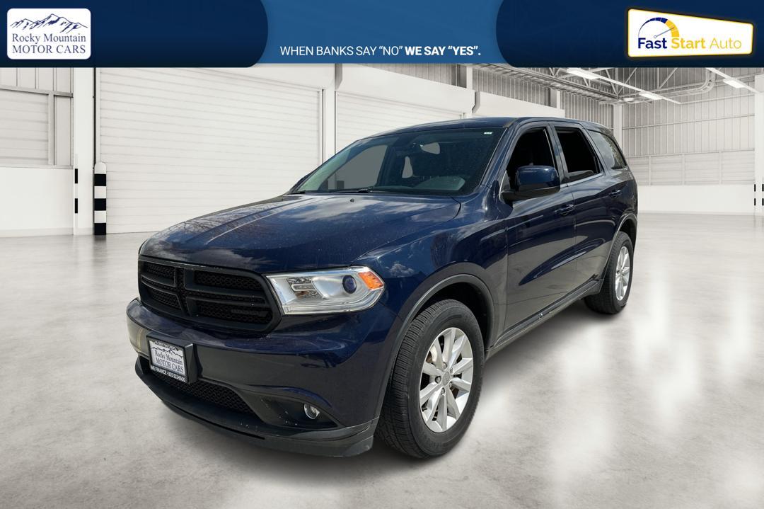 2015 Blue Dodge Durango SXT AWD (1C4RDJAG6FC) with an 3.6L V6 DOHC 24V engine, 8-Speed Automatic transmission, located at 767 S State Road, Pleasant Grove, UT, 84062, (801) 785-1058, 40.354839, -111.736687 - Photo #6
