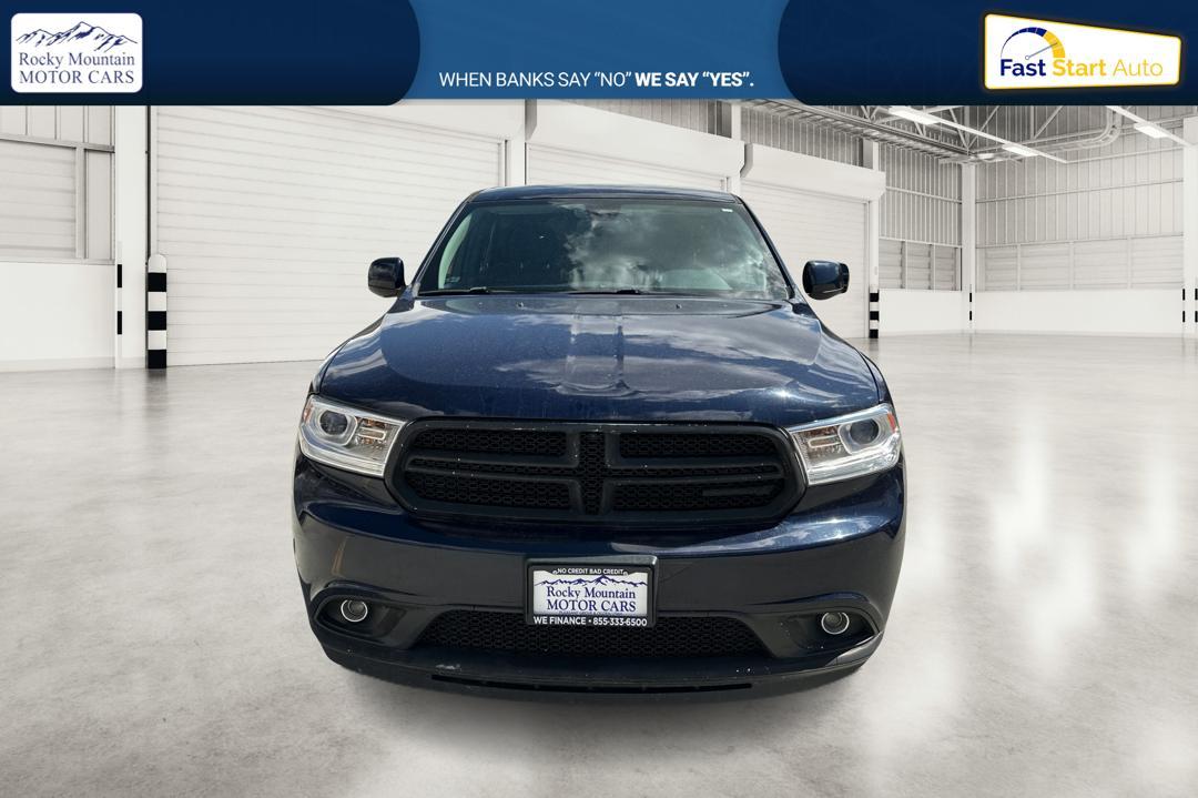 2015 Blue Dodge Durango SXT AWD (1C4RDJAG6FC) with an 3.6L V6 DOHC 24V engine, 8-Speed Automatic transmission, located at 767 S State Road, Pleasant Grove, UT, 84062, (801) 785-1058, 40.354839, -111.736687 - Photo #7