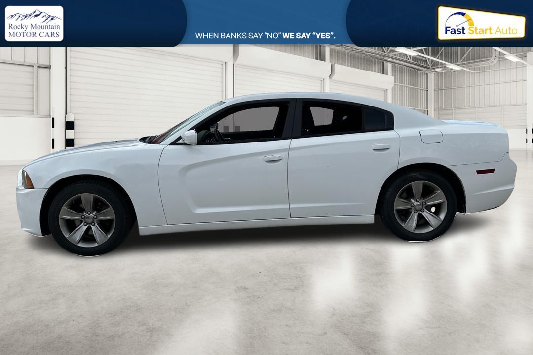 2014 White Dodge Charger SE (2C3CDXBG4EH) with an 3.6L V6 DOHC 24V engine, 5-Speed Automatic transmission, located at 767 S State Road, Pleasant Grove, UT, 84062, (801) 785-1058, 40.354839, -111.736687 - Photo#6