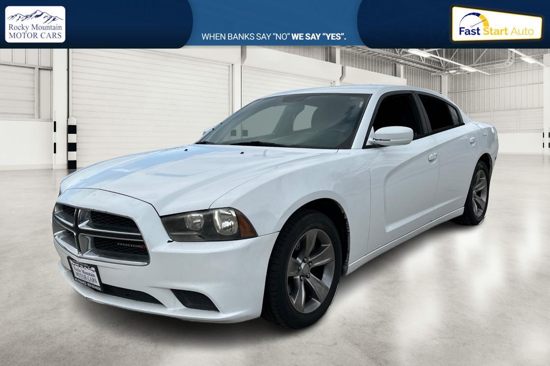 2014 White Dodge Charger SE (2C3CDXBG4EH) with an 3.6L V6 DOHC 24V engine, 5-Speed Automatic transmission, located at 767 S State Road, Pleasant Grove, UT, 84062, (801) 785-1058, 40.354839, -111.736687 - Photo#8