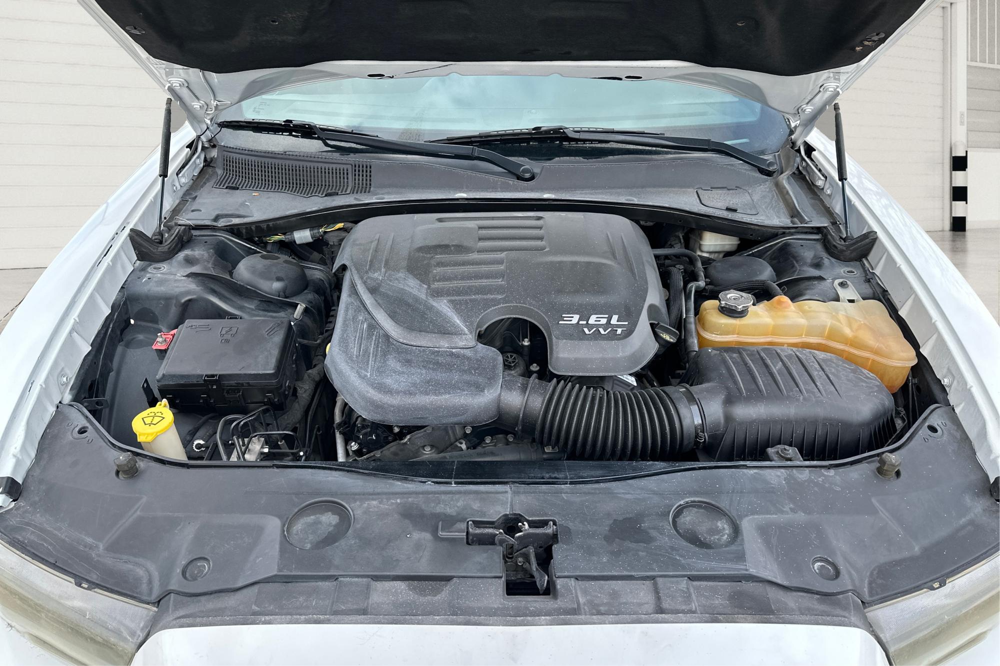 2014 White Dodge Charger SE (2C3CDXBG4EH) with an 3.6L V6 DOHC 24V engine, 5-Speed Automatic transmission, located at 767 S State Road, Pleasant Grove, UT, 84062, (801) 785-1058, 40.354839, -111.736687 - Photo#10