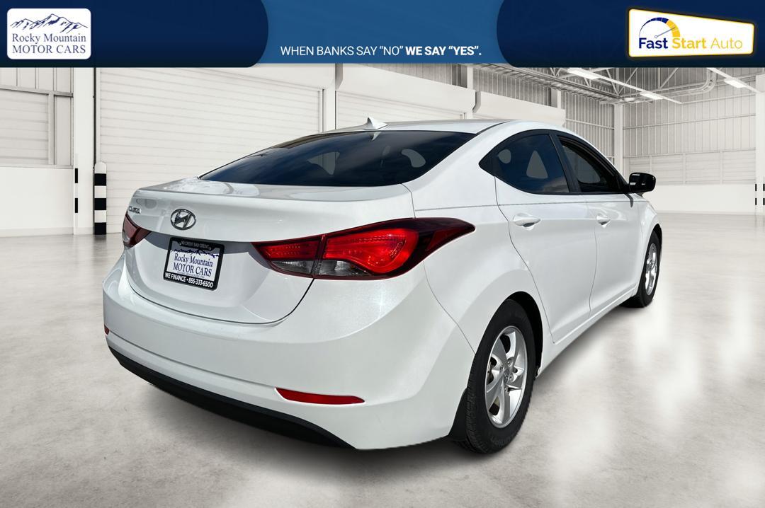 2015 White Hyundai Elantra Limited (5NPDH4AE9FH) with an 1.8L L4 DOHC 16V engine, 6-Speed Automatic transmission, located at 344 S Washington Blvd, Ogden, UT, 84404, (801) 399-1799, 41.255482, -111.970848 - Photo #2