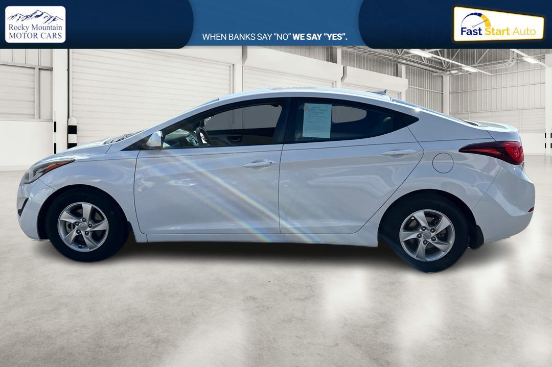 2015 White Hyundai Elantra Limited (5NPDH4AE9FH) with an 1.8L L4 DOHC 16V engine, 6-Speed Automatic transmission, located at 344 S Washington Blvd, Ogden, UT, 84404, (801) 399-1799, 41.255482, -111.970848 - Photo #5