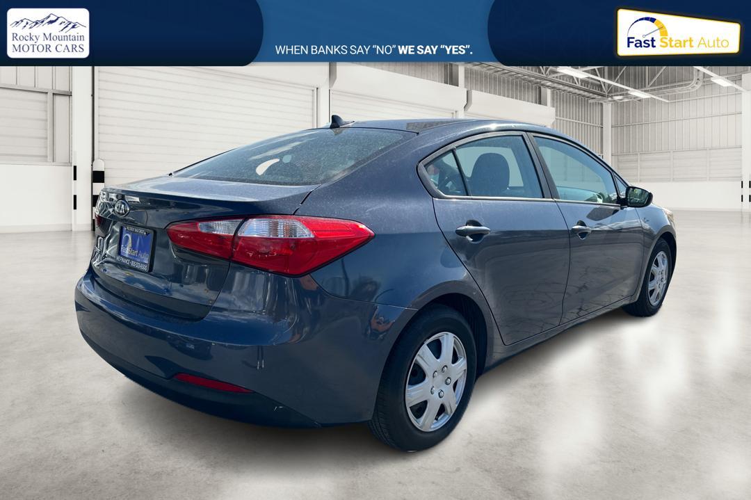 2016 Blue Kia Forte LX w/Popular Package (KNAFK4A66G5) with an 1.8L L4 DOHC 16V engine, Auto, 6-Spd w/Sportmatic and Active ECO System transmission, located at 7755 State Street, Midvale, UT, 84047, (801) 753-9063, 40.610329, -111.892159 - Photo #2