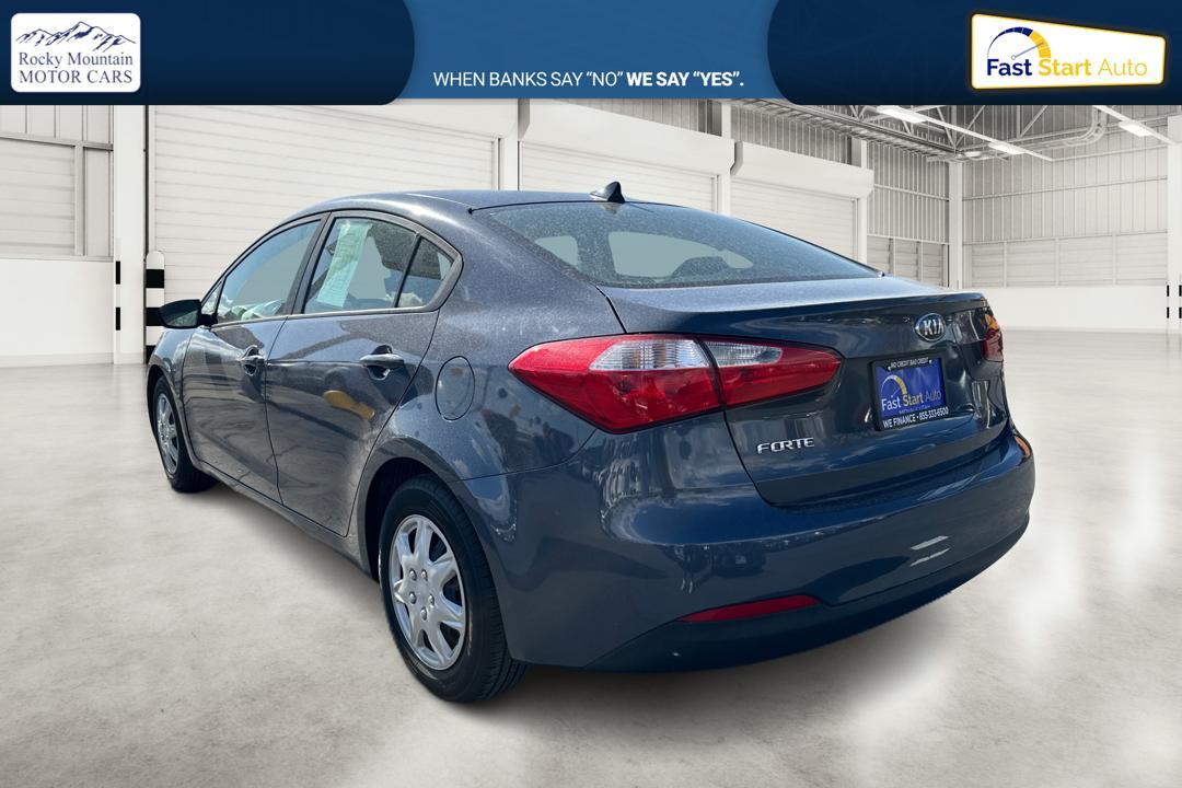 2016 Blue Kia Forte LX w/Popular Package (KNAFK4A66G5) with an 1.8L L4 DOHC 16V engine, Auto, 6-Spd w/Sportmatic and Active ECO System transmission, located at 7755 State Street, Midvale, UT, 84047, (801) 753-9063, 40.610329, -111.892159 - Photo #4
