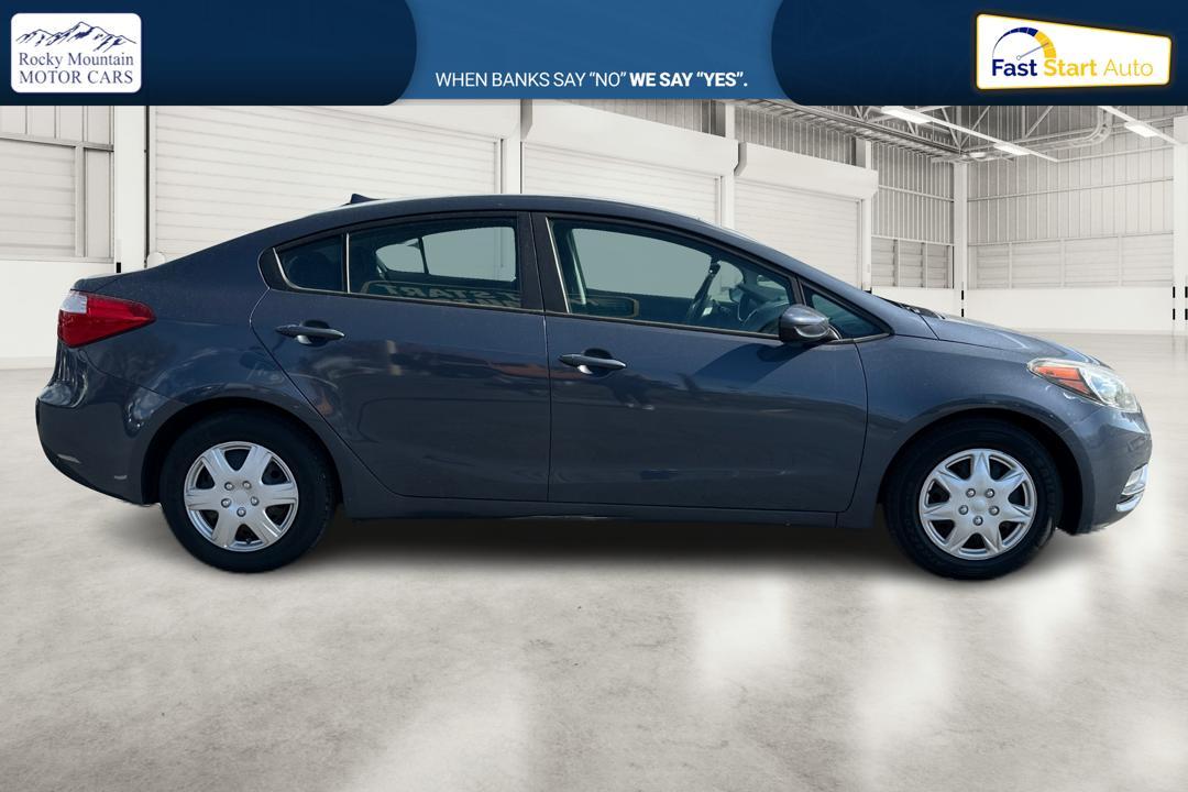 2016 Blue Kia Forte LX w/Popular Package (KNAFK4A66G5) with an 1.8L L4 DOHC 16V engine, Auto, 6-Spd w/Sportmatic and Active ECO System transmission, located at 7755 State Street, Midvale, UT, 84047, (801) 753-9063, 40.610329, -111.890656 - Photo #1
