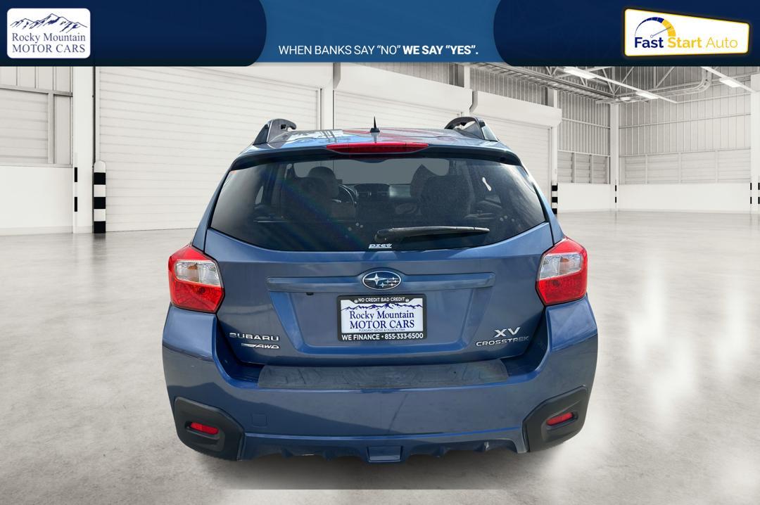 2013 Blue Subaru XV Crosstrek 2.0 Limited (JF2GPAGC2DH) with an 2.0L L4 DOHC 16V engine, Continuously Variable Transmission transmission, located at 7755 State Street, Midvale, UT, 84047, (801) 753-9063, 40.610329, -111.890656 - Photo #3