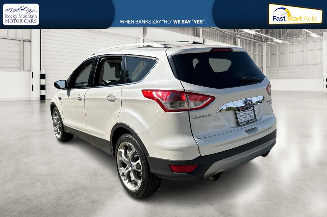 2014 White Ford Escape Titanium 4WD (1FMCU9J96EU) with an 2.0L L4 DOHC 16V engine, 6-Speed Automatic transmission, located at 7755 State Street, Midvale, UT, 84047, (801) 753-9063, 40.610329, -111.892159 - Photo#5