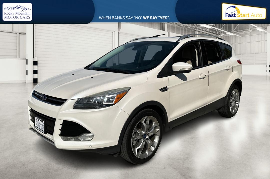 2014 White Ford Escape Titanium 4WD (1FMCU9J96EU) with an 2.0L L4 DOHC 16V engine, 6-Speed Automatic transmission, located at 7755 State Street, Midvale, UT, 84047, (801) 753-9063, 40.610329, -111.892159 - Photo#8