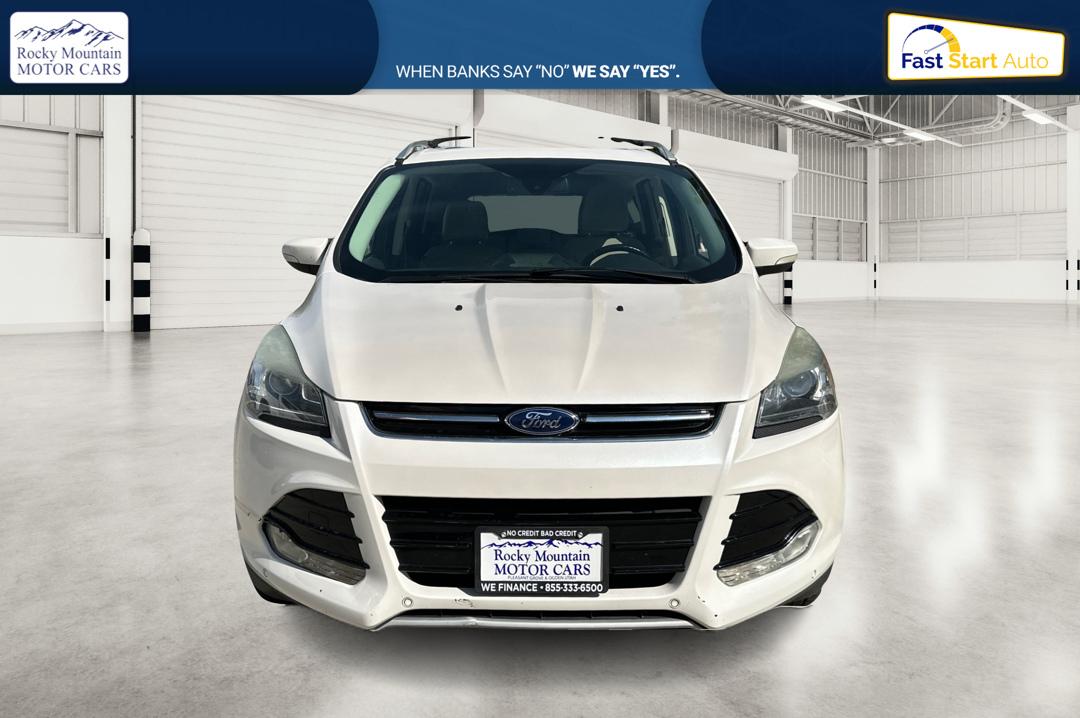 2014 White Ford Escape Titanium 4WD (1FMCU9J96EU) with an 2.0L L4 DOHC 16V engine, 6-Speed Automatic transmission, located at 7755 State Street, Midvale, UT, 84047, (801) 753-9063, 40.610329, -111.892159 - Photo#9