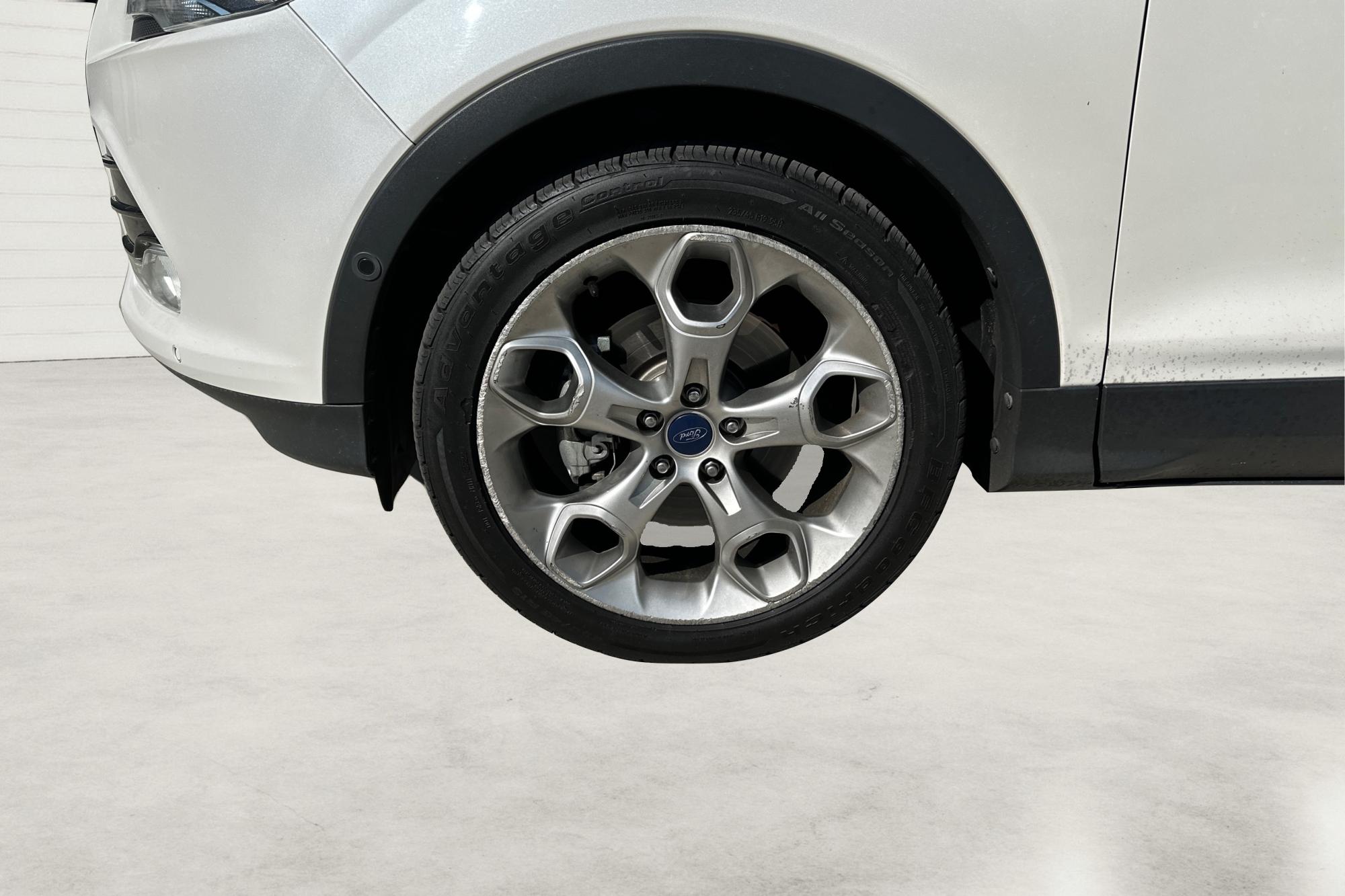 2014 White Ford Escape Titanium 4WD (1FMCU9J96EU) with an 2.0L L4 DOHC 16V engine, 6-Speed Automatic transmission, located at 7755 State Street, Midvale, UT, 84047, (801) 753-9063, 40.610329, -111.892159 - Photo#12