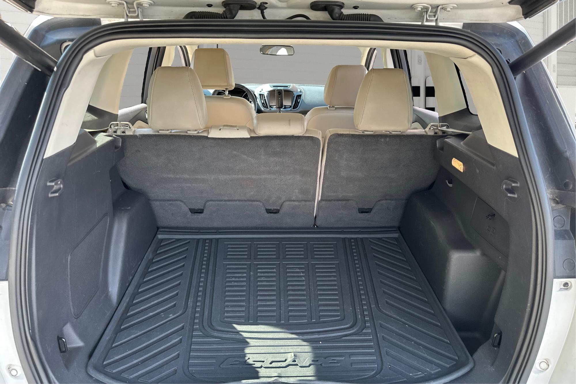 2014 White Ford Escape Titanium 4WD (1FMCU9J96EU) with an 2.0L L4 DOHC 16V engine, 6-Speed Automatic transmission, located at 7755 State Street, Midvale, UT, 84047, (801) 753-9063, 40.610329, -111.892159 - Photo#13