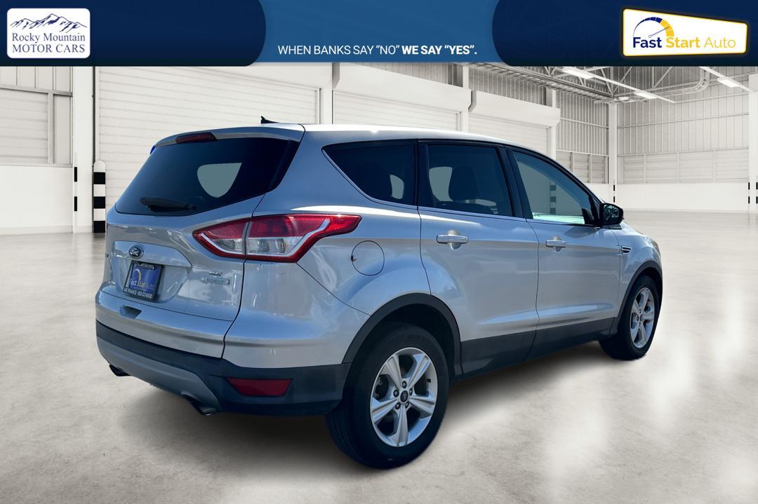 2015 Silver Ford Escape SE FWD (1FMCU0G95FU) with an 2.0L L4 DOHC 16V engine, 6-Speed Automatic transmission, located at 7755 State Street, Midvale, UT, 84047, (801) 753-9063, 40.610329, -111.890656 - Photo #2