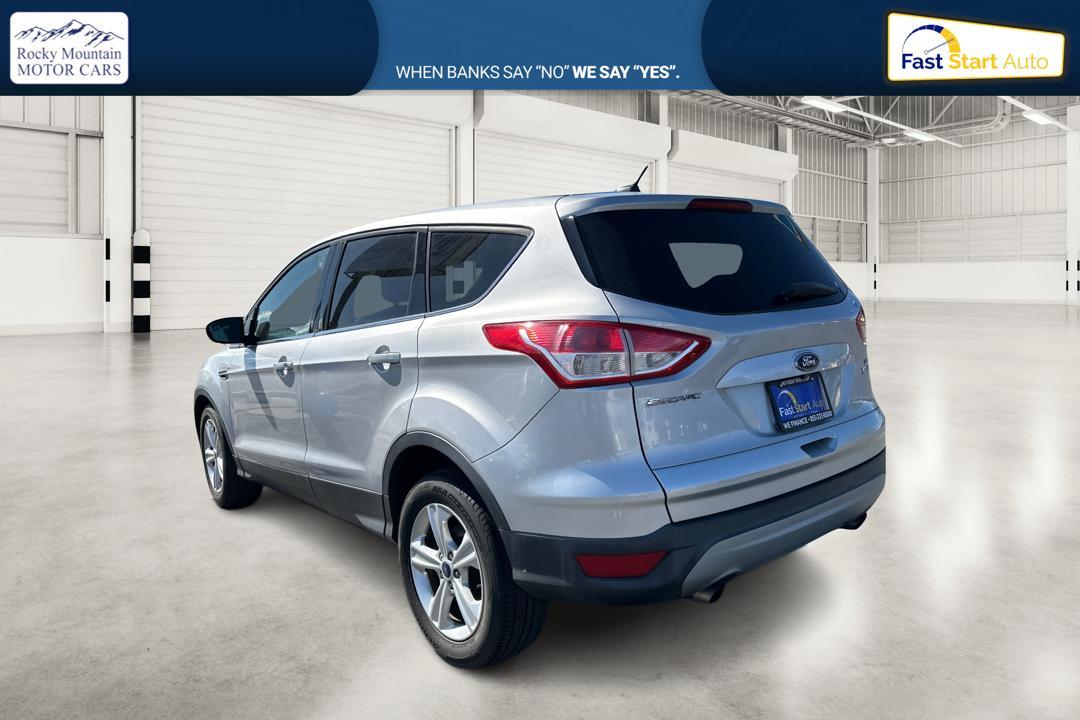 2015 Silver Ford Escape SE FWD (1FMCU0G95FU) with an 2.0L L4 DOHC 16V engine, 6-Speed Automatic transmission, located at 7755 State Street, Midvale, UT, 84047, (801) 753-9063, 40.610329, -111.890656 - Photo #4
