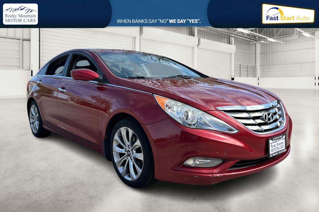 2013 Red Hyundai Sonata Limited Auto (5NPEC4AC9DH) with an 2.4L L4 DOHC 16V engine, 6-Speed Automatic transmission, located at 767 S State Road, Pleasant Grove, UT, 84062, (801) 785-1058, 40.354839, -111.736687 - Photo #0